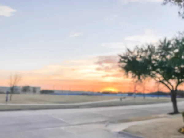 Blurry background beautiful sunset at city park suburban Dallas, — Stock Photo, Image