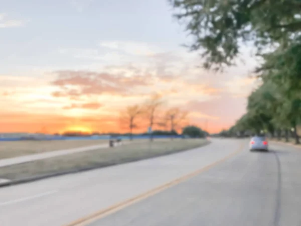 Rozmyte tło piękny zachód słońca w park city podmiejskich Dallas, — Zdjęcie stockowe