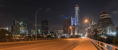 Panoramic Austin modern skylines and state capitol building at n clipart