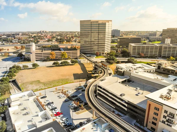 Top view light rail system and skylines in downtown Las Colinas,