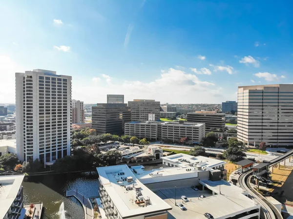 Top view light rail system and skylines in downtown Las Colinas,