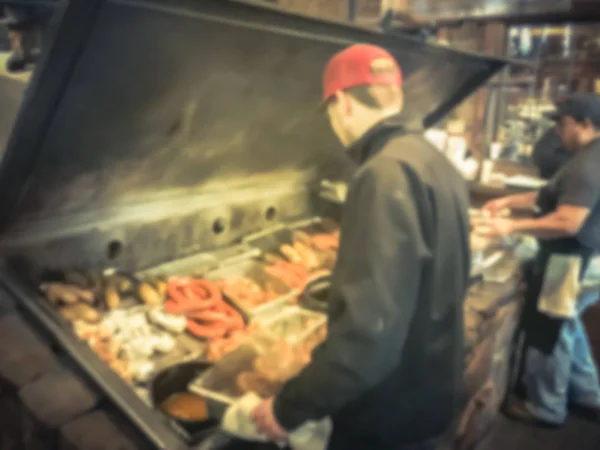 Blurry background kitchen with smoke pit of Texas-style barbecue — Stock Photo, Image