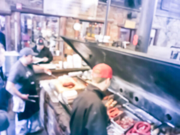 Motion blurred rustic smoke pit of Texas-style barbecue restaurant