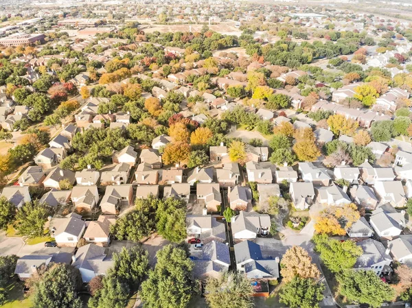 Top view urban sprawl suburbs Dallas during autumn season with c