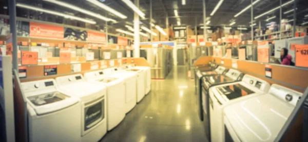 Panoramic blurry background refrigerators on display at hardware store in USA — Stock Photo, Image