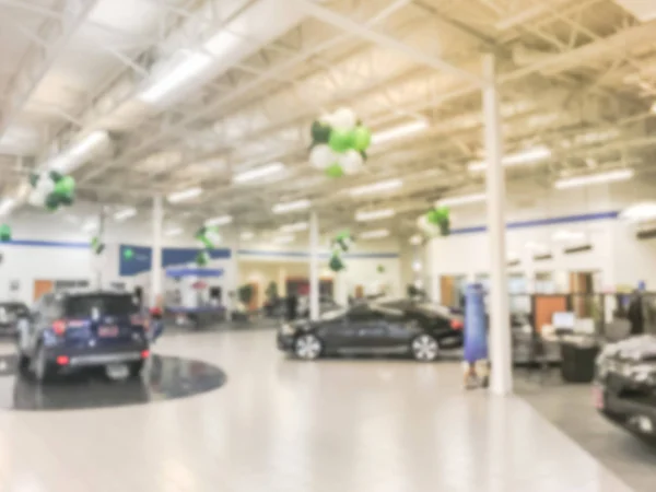 Fundo embaçado dentro enorme carro concessionária no Texas, América — Fotografia de Stock