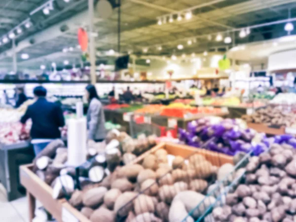 Fond flou large sélection de fruits frais à l'épicerie asiatique aux États-Unis — Photo