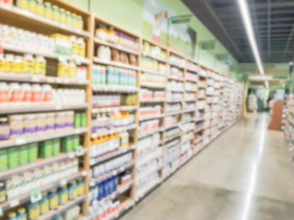Blurry background wide selection of vitamin at supermarket in USA — Stock Photo, Image