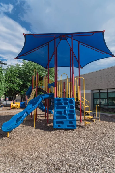 Neighborhood playground with colorful structure equipment near Dallas, Texas