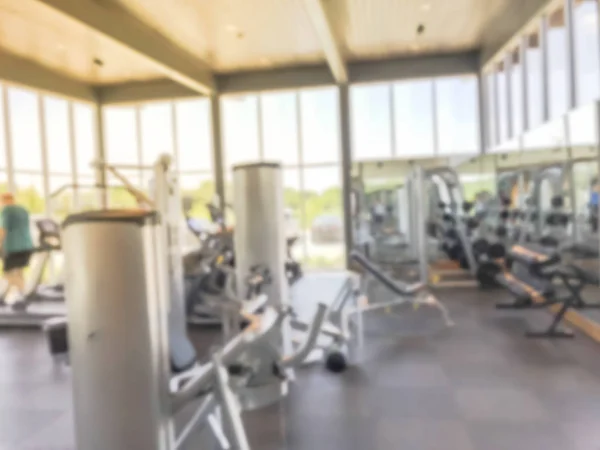 Blurry background open fitness center with people workout at new home community in USA — Stock Photo, Image