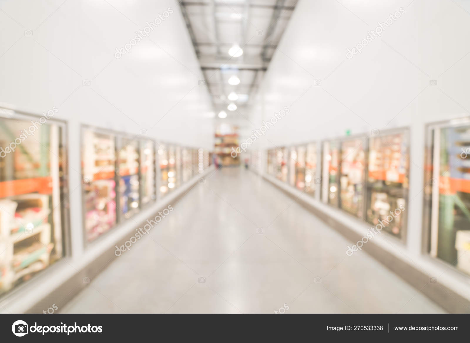 Blurry Background Glass Door Frozen Food Aisle At Big Box Store In