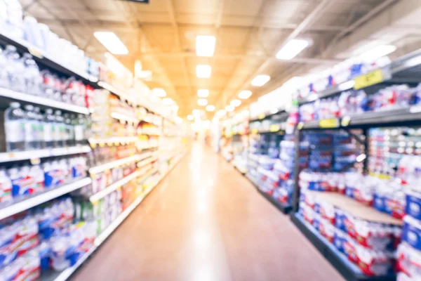 Blurry background variety of canned foods on shelf at American supermarket — Stock Photo, Image