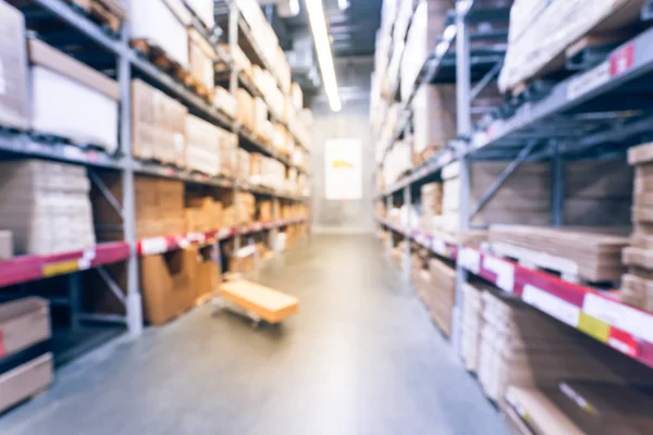 Blurry background flatbed cart at giant furniture warehouse store in America — Stock Photo, Image