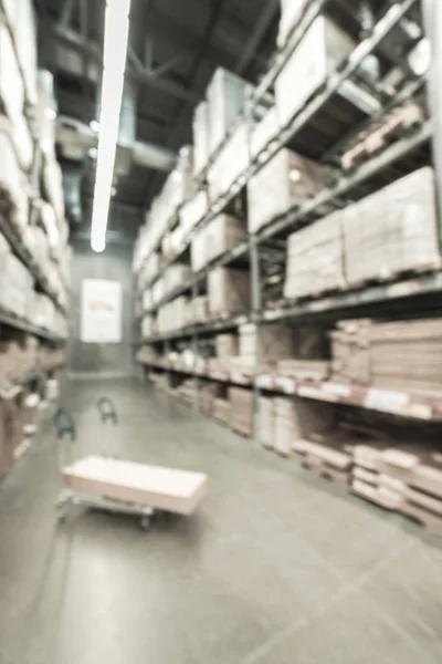 Szűrt kép elmosódott háttér síkágyas kocsi a hatalmas bútor raktár áruház USA-ban — Stock Fotó