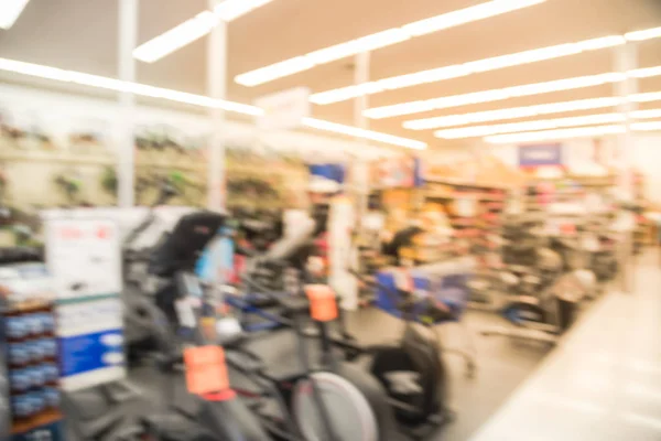 Blurry background selection of fitness equipment at American sporting goods retail company