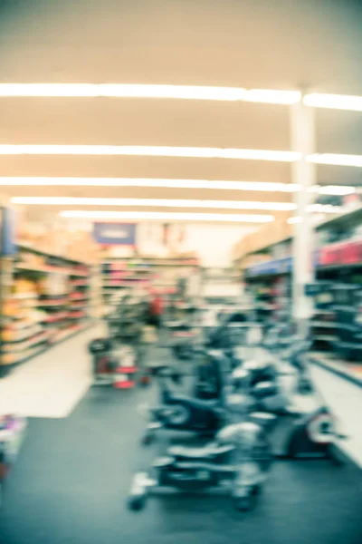 Blurry background selection of fitness equipment at American sporting goods retail company
