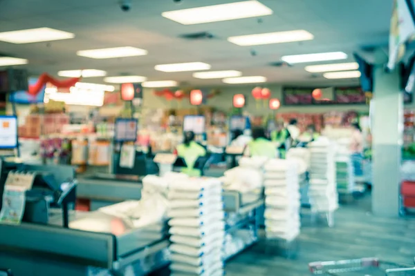 Filtered image blurry background checkout counter at Asian supermarket in USA