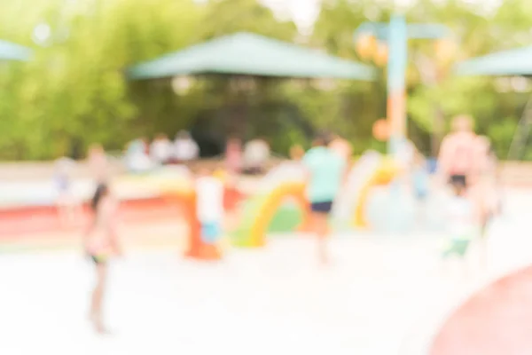 Fondo borroso diversos niños jugando en la almohadilla de salpicadura de agua en Houston, Texas —  Fotos de Stock