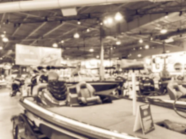 Filtered image blurry background large boat showroom outdoor store in America