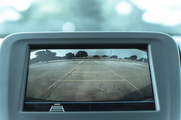 Filtered image rear view system monitor on dash camera backup at parking lots