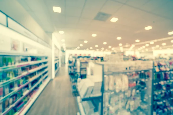 Filtered image blurry background cosmetics and makeup supplies at American beauty store