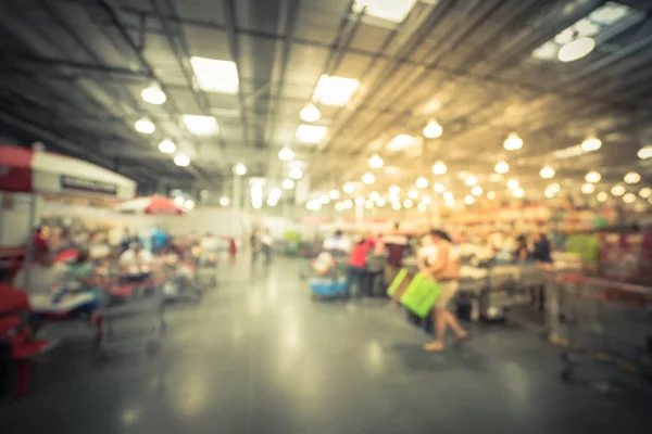 Blurry background busy checkout line at wholesale big-box store in America — Stock Photo, Image