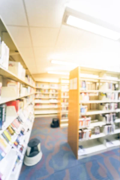 Blurry background aisle of bookshelf with step stool at American public library — Stock Photo, Image