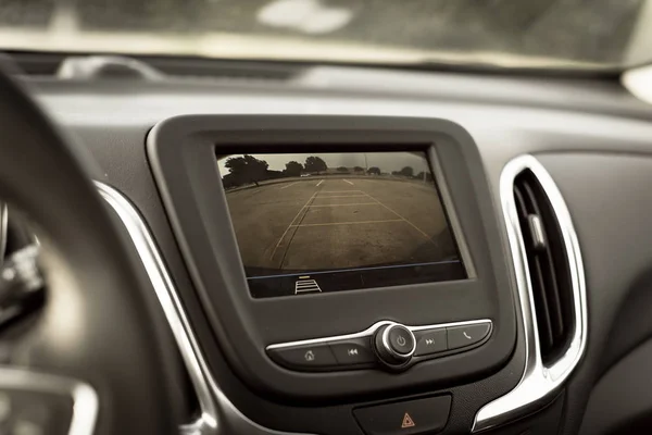 Filtered image rear view system monitor on dash camera backup at parking lots