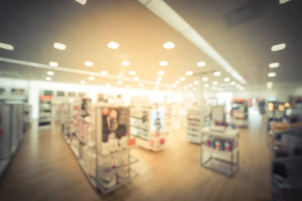 Blurry background cosmetics and makeup supplies at American beauty store