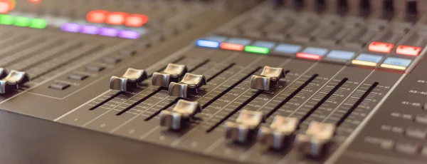 Panoramic view colorful sound mixer control DJ turntable close-up