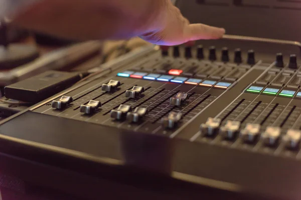 Colorful sound mixer control DJ turntable close-up