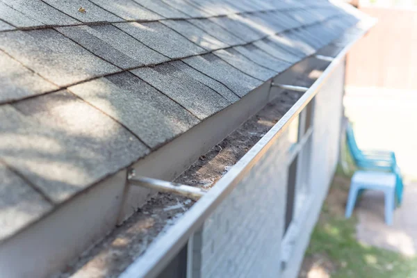 Top view gutter blocked by dried leaves and messy dirt need clean-up — Stock Photo, Image