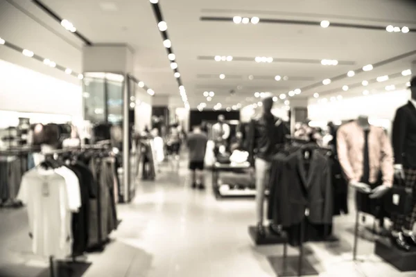 Immagine filtrata sfocato sfondo cliente shopping per la collezione autunno a uomini negozio di abbigliamento in Texas — Foto Stock