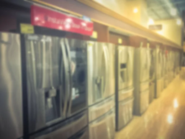 Linhas de fundo borradas de refrigeradores de porta franceses novos com fabricantes de gelo — Fotografia de Stock