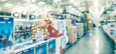 Texas toptan mağazasında Led ışıklı geyik için bulanık arka plan müşteri alışveriş