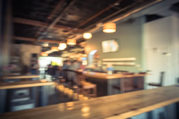 Blurry background people sitting at tap room of modern brewery in Washington state — Stock Photo, Image