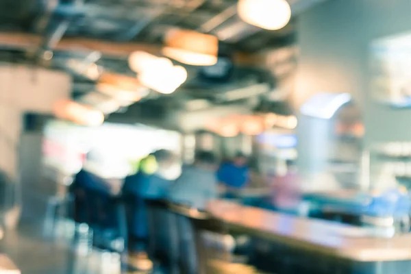 Filtered image blurry background people sitting at bar counter of modern brewery in Washington state — Stock Photo, Image