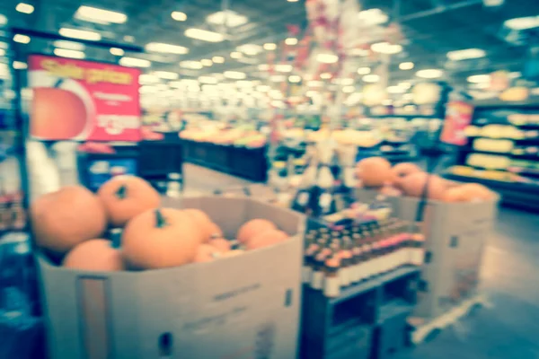 Filtered image blurry background festive Halloween decoration at supermarket in Houston