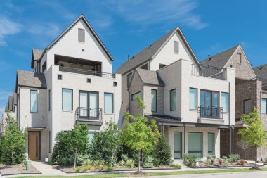 Modern porch of new development three story single family houses near Dallas, Texas clipart