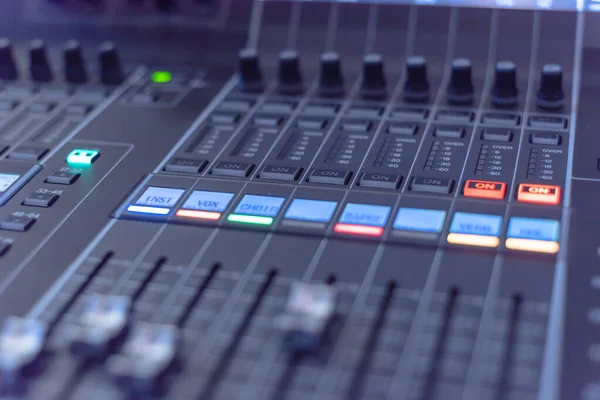Colorful sound mixer control DJ turntable close-up