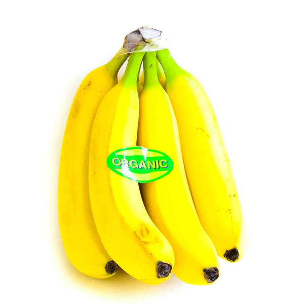 Studio shot organic labeled banana cluster isolated on white — 스톡 사진