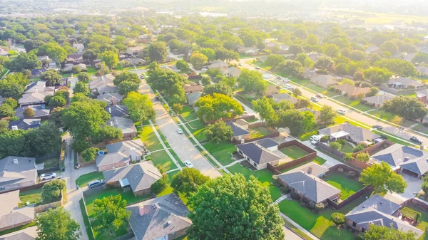 Aerial view urban sprawl subdivision near Dallas, Texas, USA row of single family homes large fenced backyard — Stock Photo, Image