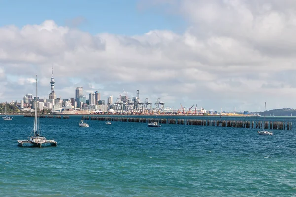 Auckland skyline with moored boats and copy space