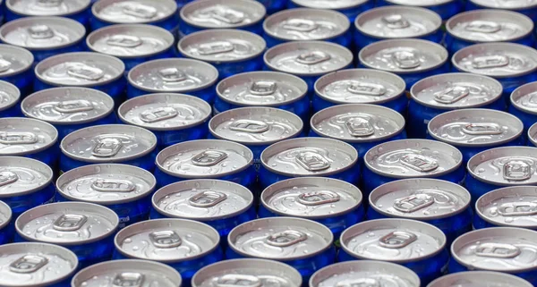 Pattern repeating of beer cans in alcohol and beverage department of superstore close up