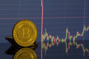 Bitcoin sikke üzerinde arka plan grafiklerini yakın çekim