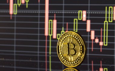 Bitcoin sikke üzerinde arka plan grafiklerini yakın çekim