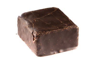 Kare şeker kamışı ile beyaz bir arka planda üstten görünüm yüzeyinde çatlaklar