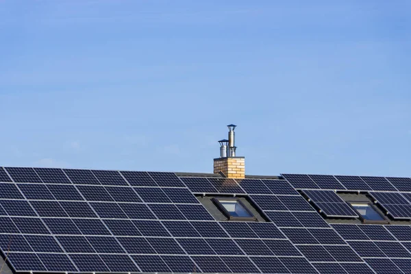 Solar installation for generating green electricity on the roof of a residential house.