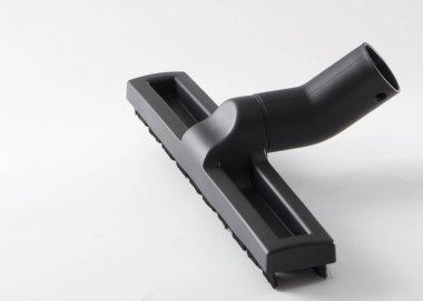 Elektrik süpürgesi beyaz bir arka plan üzerinde siyah meme yakın çekim