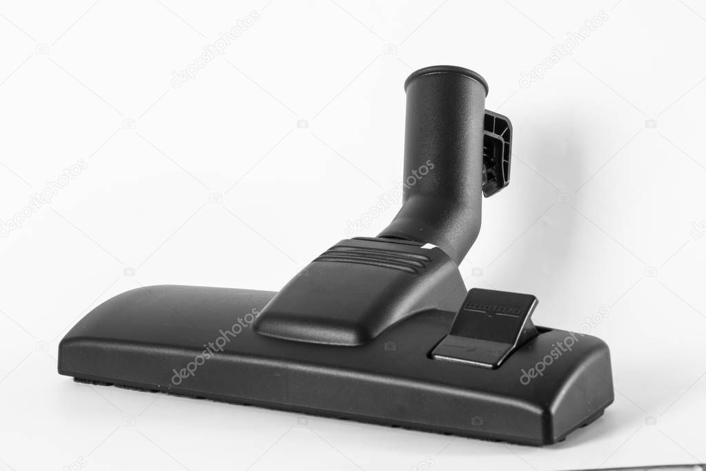 Black nozzle for vacuum cleaner on a white background close up